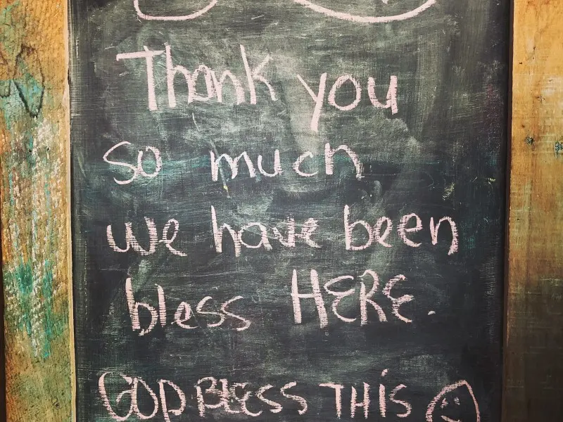 A chalkboard with the words " thank you so much we have been bless here ".