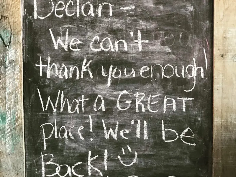 A chalkboard with some writing on it