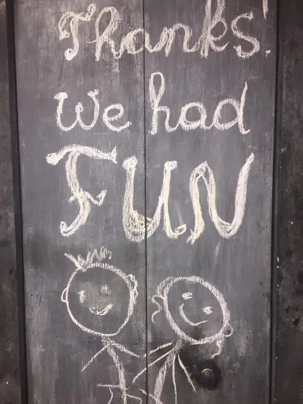 A chalkboard with the words " there is we had fun ".